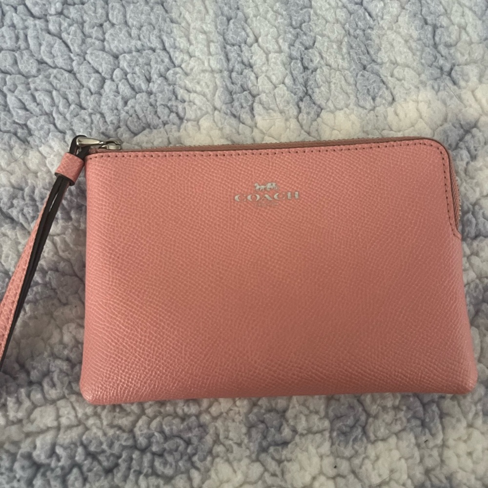 Pink Coach wristlet with silver hardware!